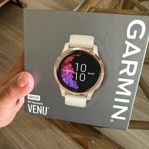 Garmin Venu Smartwatch - Cream Band with Gold Bezel
